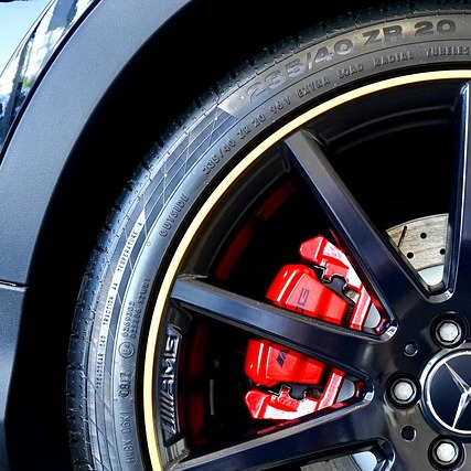alloy wheel red brake caliper